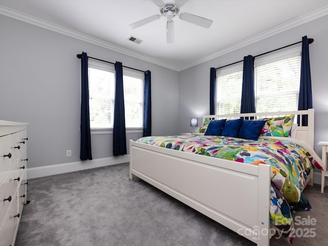 bedroom featuring ornamental molding, carpet floors, and ceiling fan