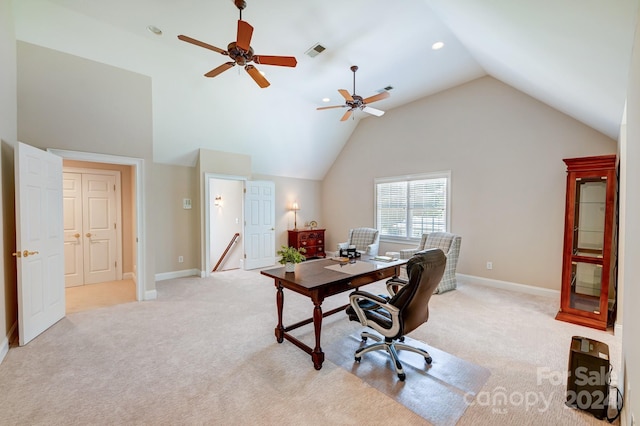 home office featuring ceiling fan, light colored carpet, and lofted ceiling