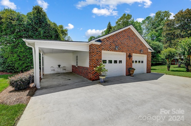 view of front of property with a carport