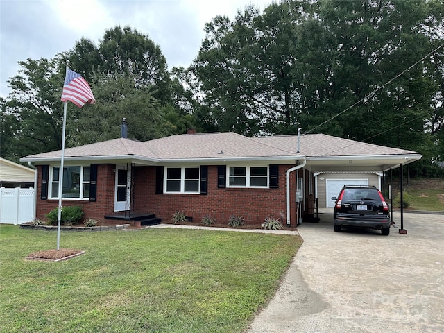 ranch-style house with a garage and a front lawn