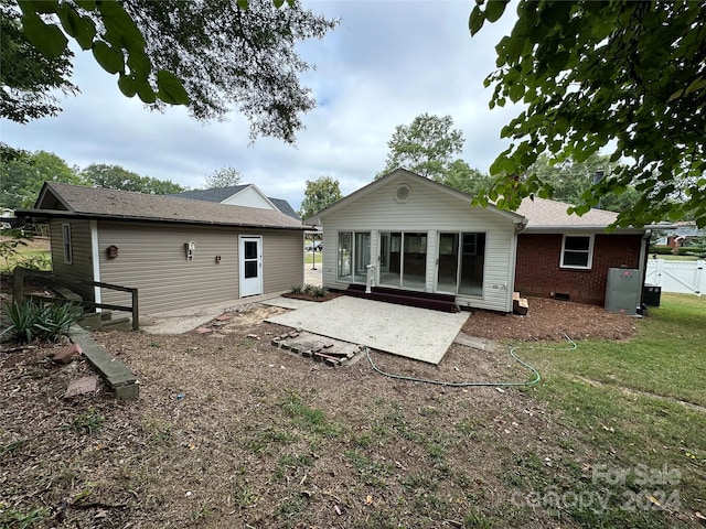 rear view of house with a patio area