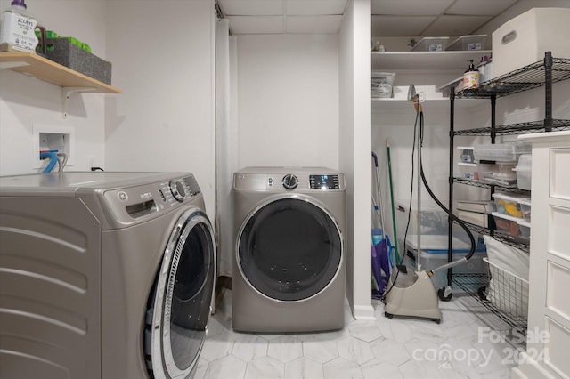 washroom with washer and clothes dryer