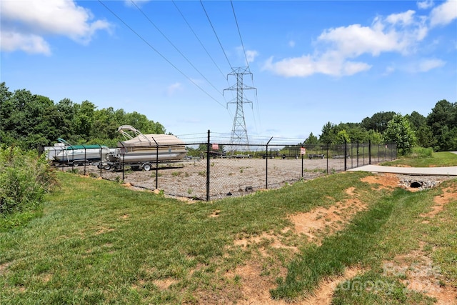 view of yard with a rural view