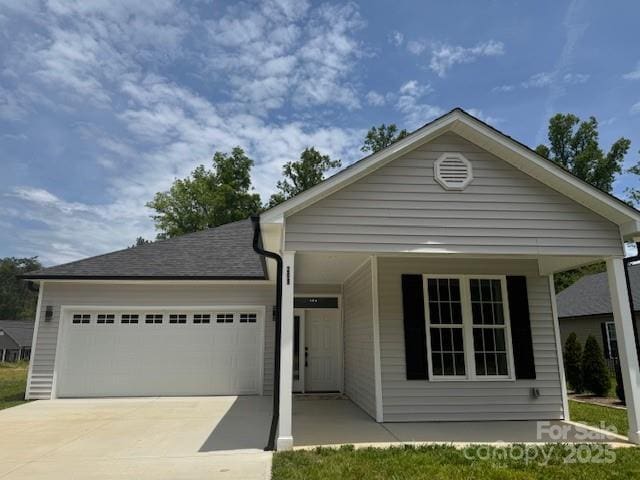 209 Eagles Lndg, Morganton, NC 28655 - view of front facade with an attached garage and driveway