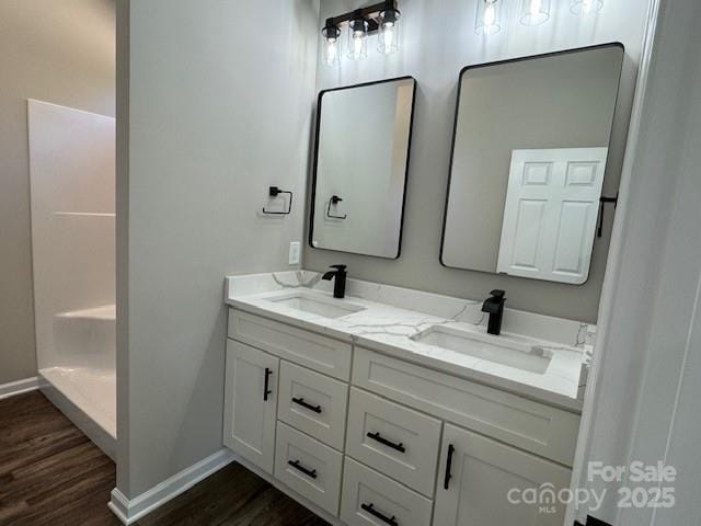209 Eagles Lndg, Morganton, NC 28655 - full bath with double vanity, wood finished floors, baseboards, and a shower