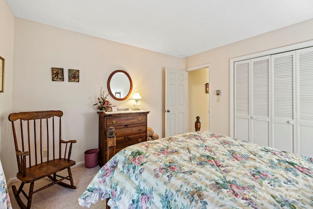 carpeted bedroom with a closet