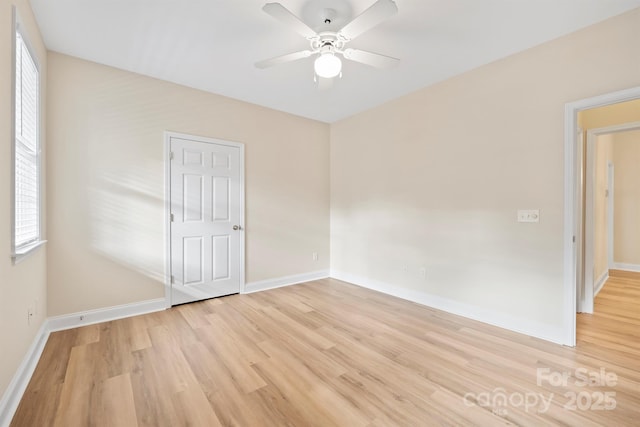 unfurnished room with light hardwood / wood-style floors and ceiling fan