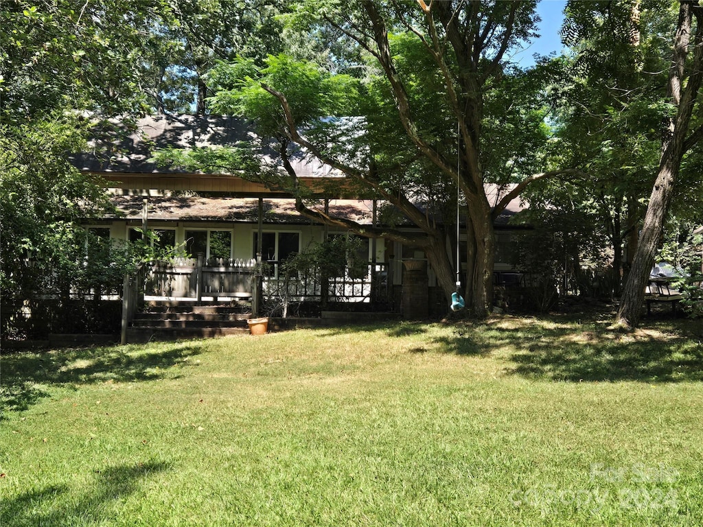 view of yard featuring a deck