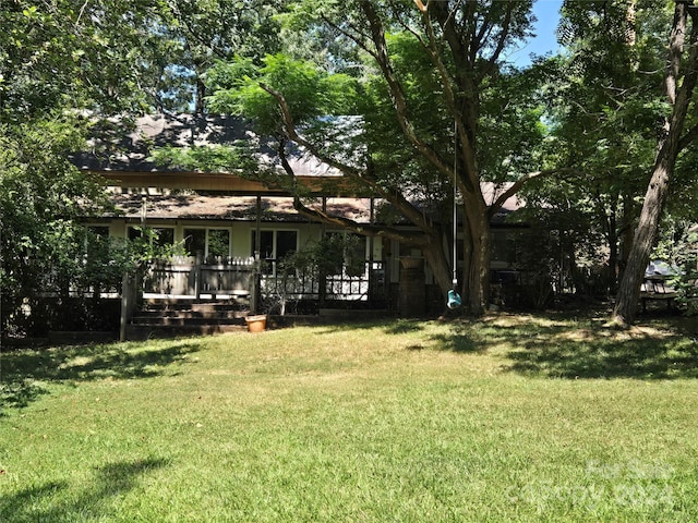 view of yard featuring a deck