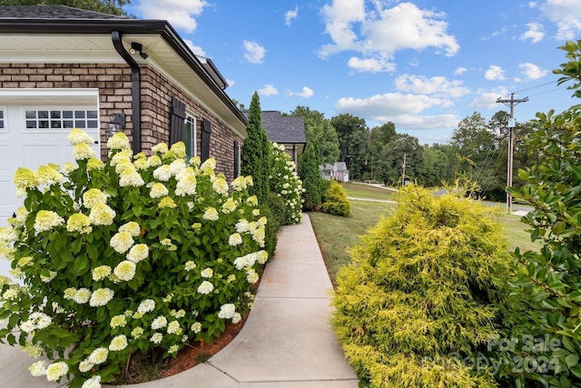 view of home's exterior with a garage