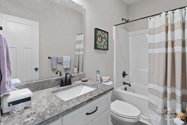 full bathroom featuring toilet, vanity, and shower / tub combo with curtain