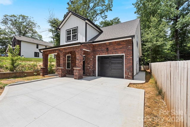 view of front of property with a garage