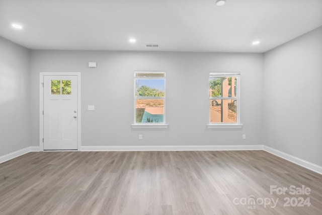 empty room featuring hardwood / wood-style floors