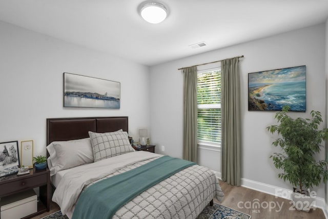 bedroom featuring light hardwood / wood-style flooring