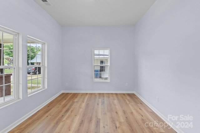 empty room featuring light hardwood / wood-style floors