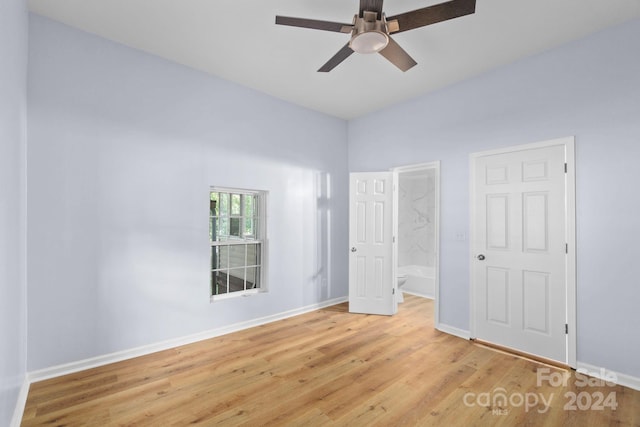 unfurnished bedroom with light wood-type flooring and ceiling fan