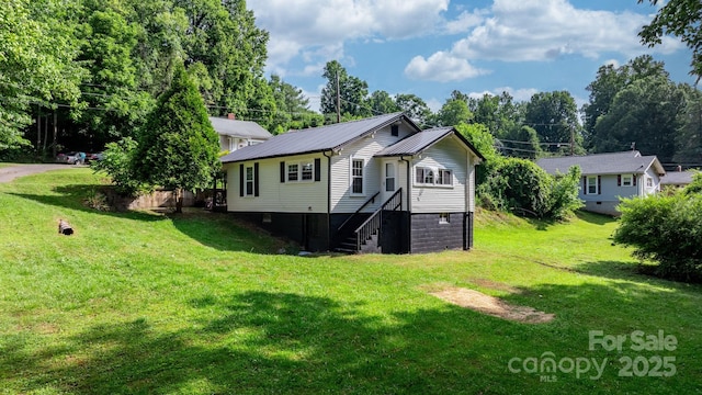 exterior space with a lawn