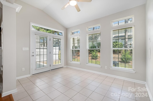 interior space featuring a healthy amount of sunlight, ceiling fan, and light tile patterned flooring