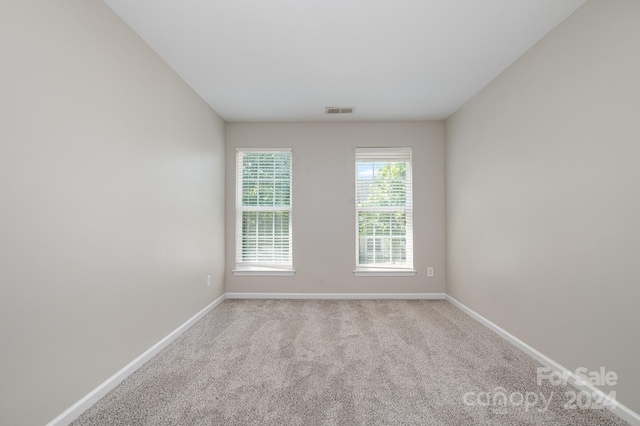 view of carpeted spare room