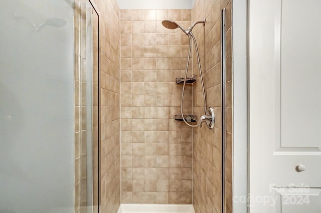 bathroom featuring an enclosed shower