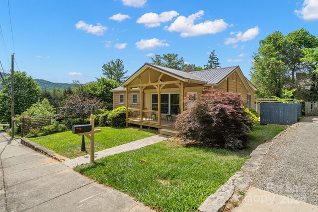 view of front of home with a front yard