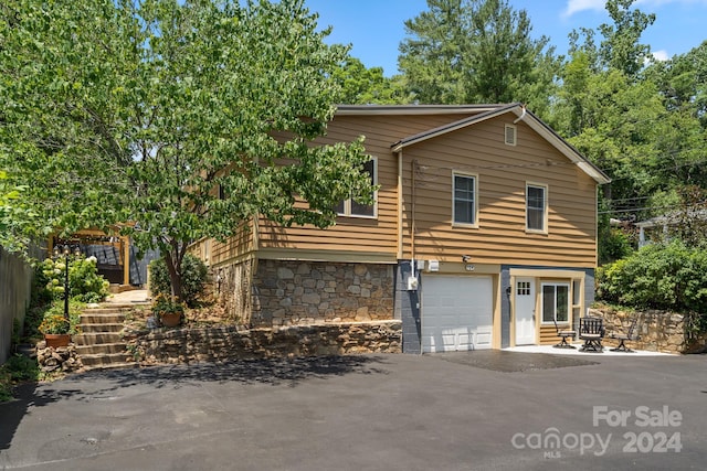 view of property with a garage