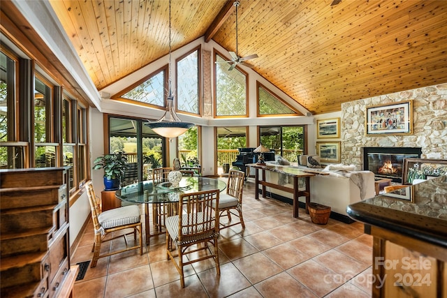 sunroom featuring beamed ceiling