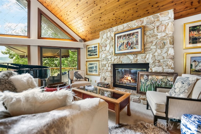 carpeted living room with high vaulted ceiling, a fireplace, and wood ceiling