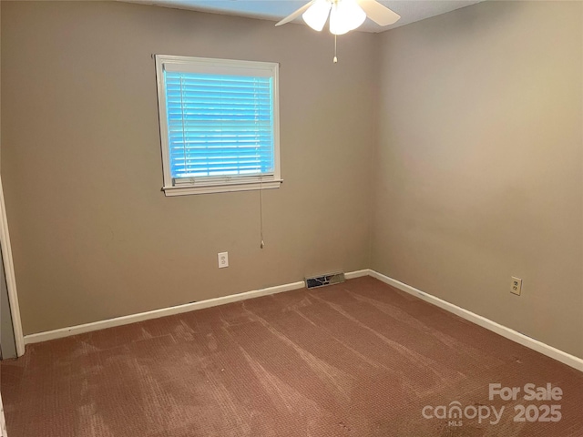 1111 S Skyland Dr, Mount Pleasant, NC 28124 - spare room featuring carpet, visible vents, baseboards, and ceiling fan
