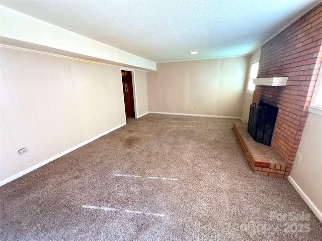 1111 S Skyland Dr, Mount Pleasant, NC 28124 - unfurnished living room with a fireplace, carpet, a textured ceiling, and baseboards