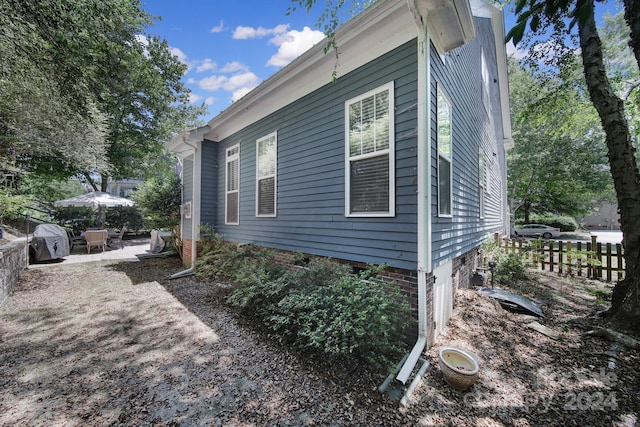 view of home's exterior featuring a patio