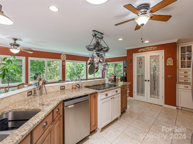 kitchen with light stone countertops, stainless steel dishwasher, crown molding, decorative light fixtures, and light tile patterned floors