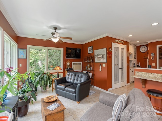 tiled living room featuring ceiling fan and ornamental molding