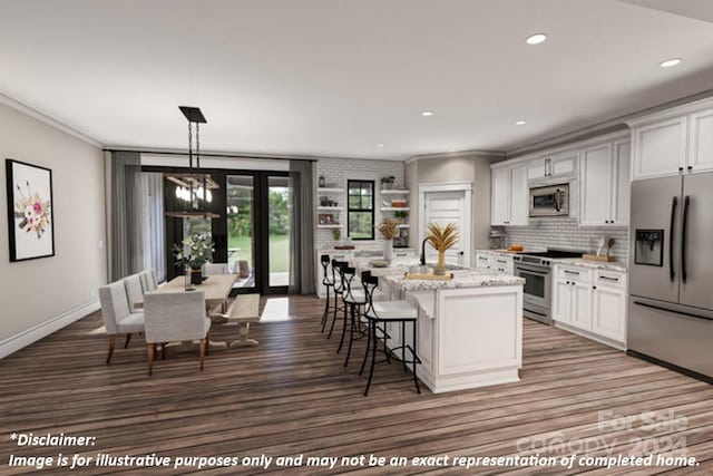 kitchen with stainless steel appliances, light stone countertops, pendant lighting, white cabinets, and a center island