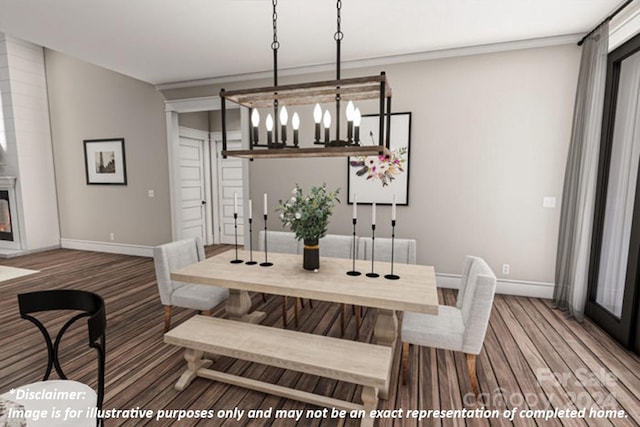 dining room with hardwood / wood-style flooring and a large fireplace