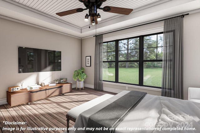 bedroom featuring ceiling fan, wood-type flooring, a raised ceiling, and ornamental molding