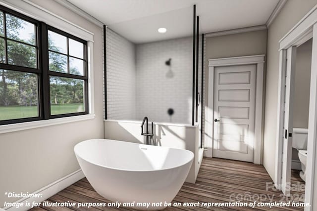 bathroom featuring toilet, a bathing tub, and wood-type flooring