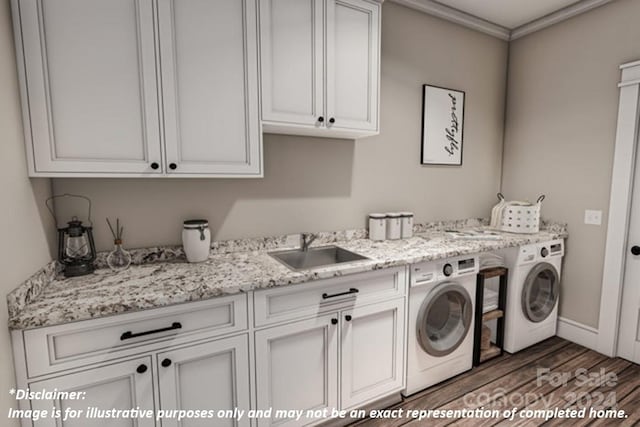 laundry room featuring sink, dark wood-type flooring, separate washer and dryer, ornamental molding, and cabinets