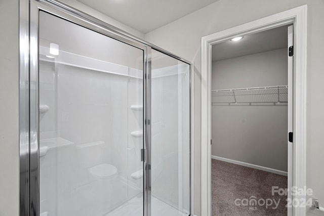 bathroom with walk in shower