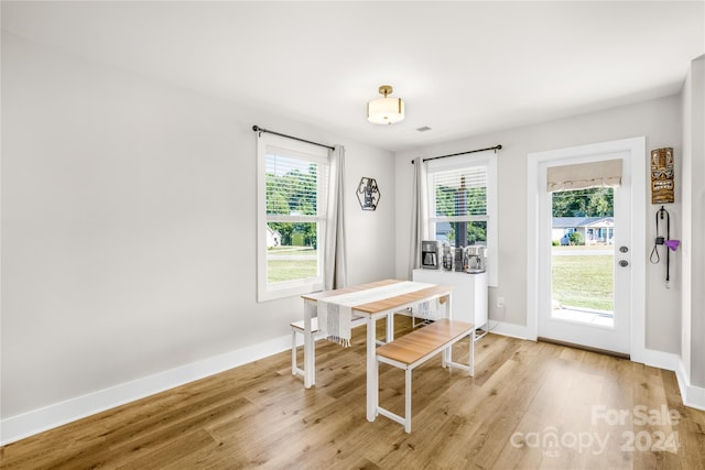 dining area with light hardwood / wood-style flooring