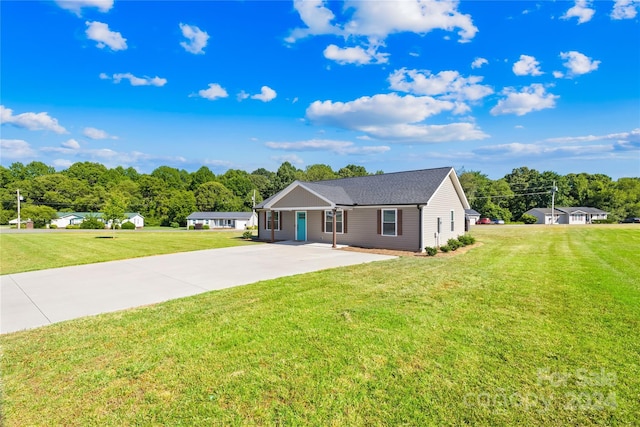 single story home with a front yard