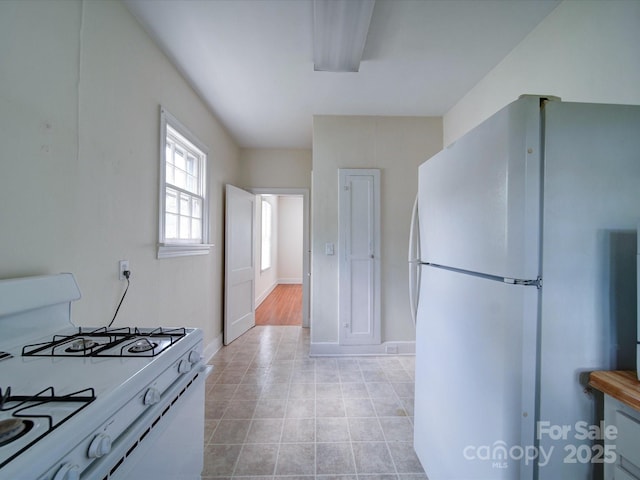 kitchen featuring white appliances