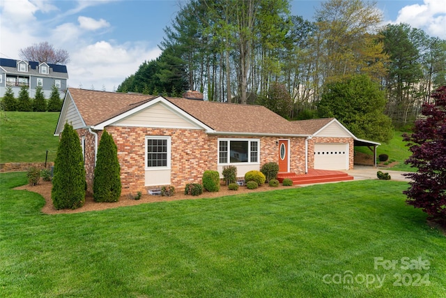 ranch-style home with a front lawn and a garage