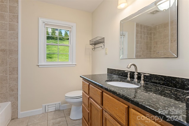 full bathroom featuring tile patterned floors, vanity, toilet, and shower / bath combination