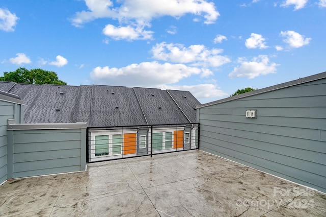 back of house with a patio