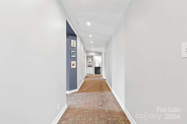 corridor with carpet floors