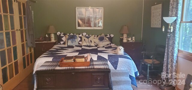 bedroom featuring hardwood / wood-style flooring