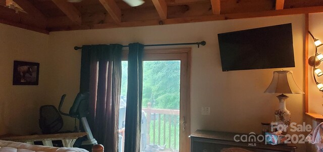 bedroom featuring beam ceiling