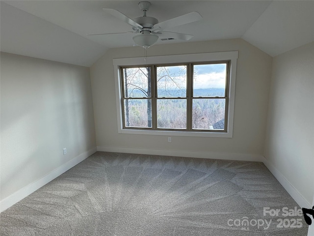 bonus room featuring visible vents, lofted ceiling, baseboards, and carpet flooring