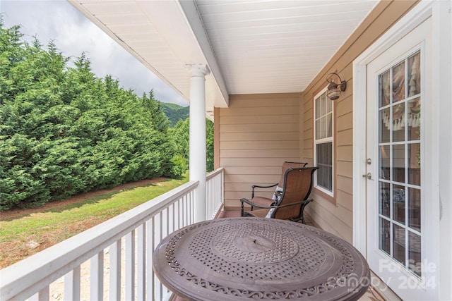 balcony featuring a porch